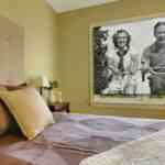 Modern fresh bedroom wtih oak floor and browns bedding